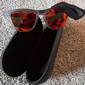 Oakley Frogskin Sunglasses with gray Frame and Redish Orange Lenses